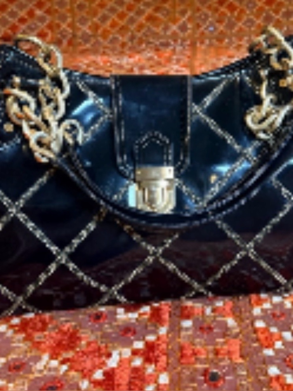 EricJavits, black quilted,patent leather bag with gold chain